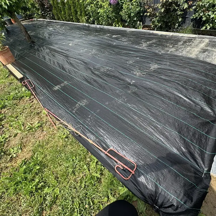 ¿Cómo mejora la tela de barrera contra malezas biodegradable el control sostenible de malezas?